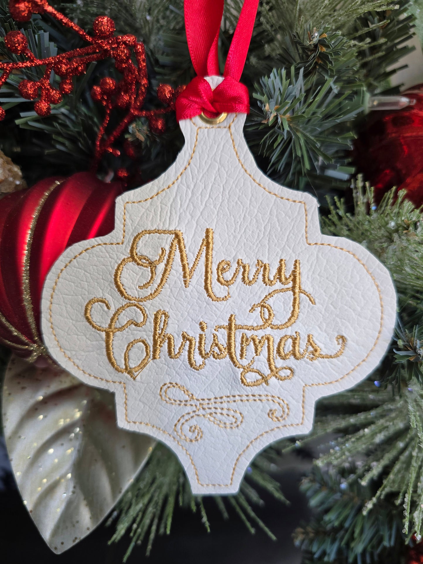 Merry Christmas, handcut vinyl ornament with satin ribbon