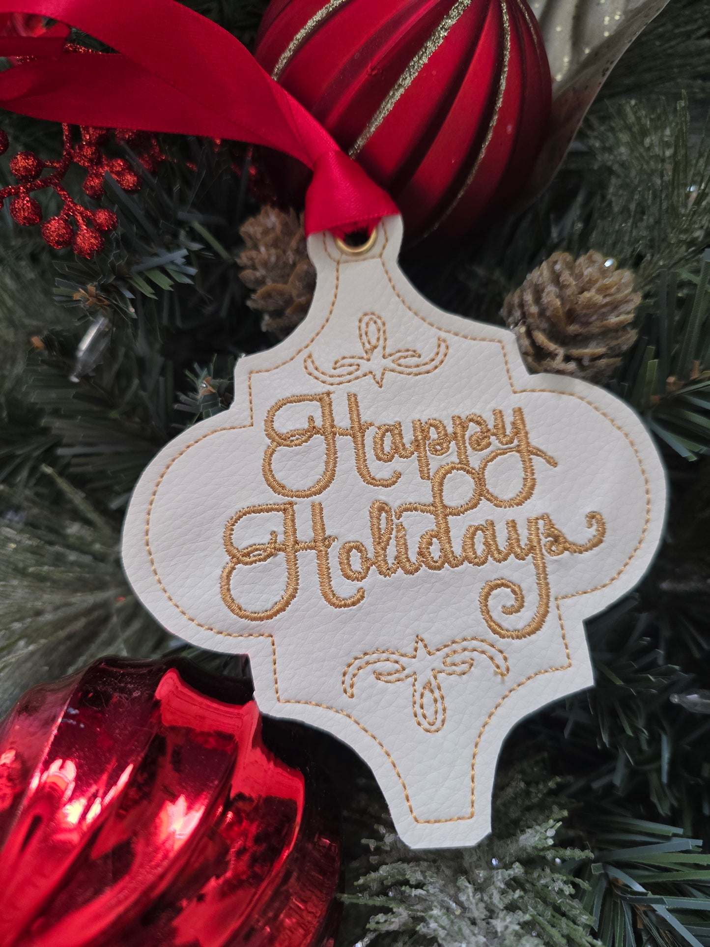 Happy Holidays, handcut vinyl ornament with satin ribbon