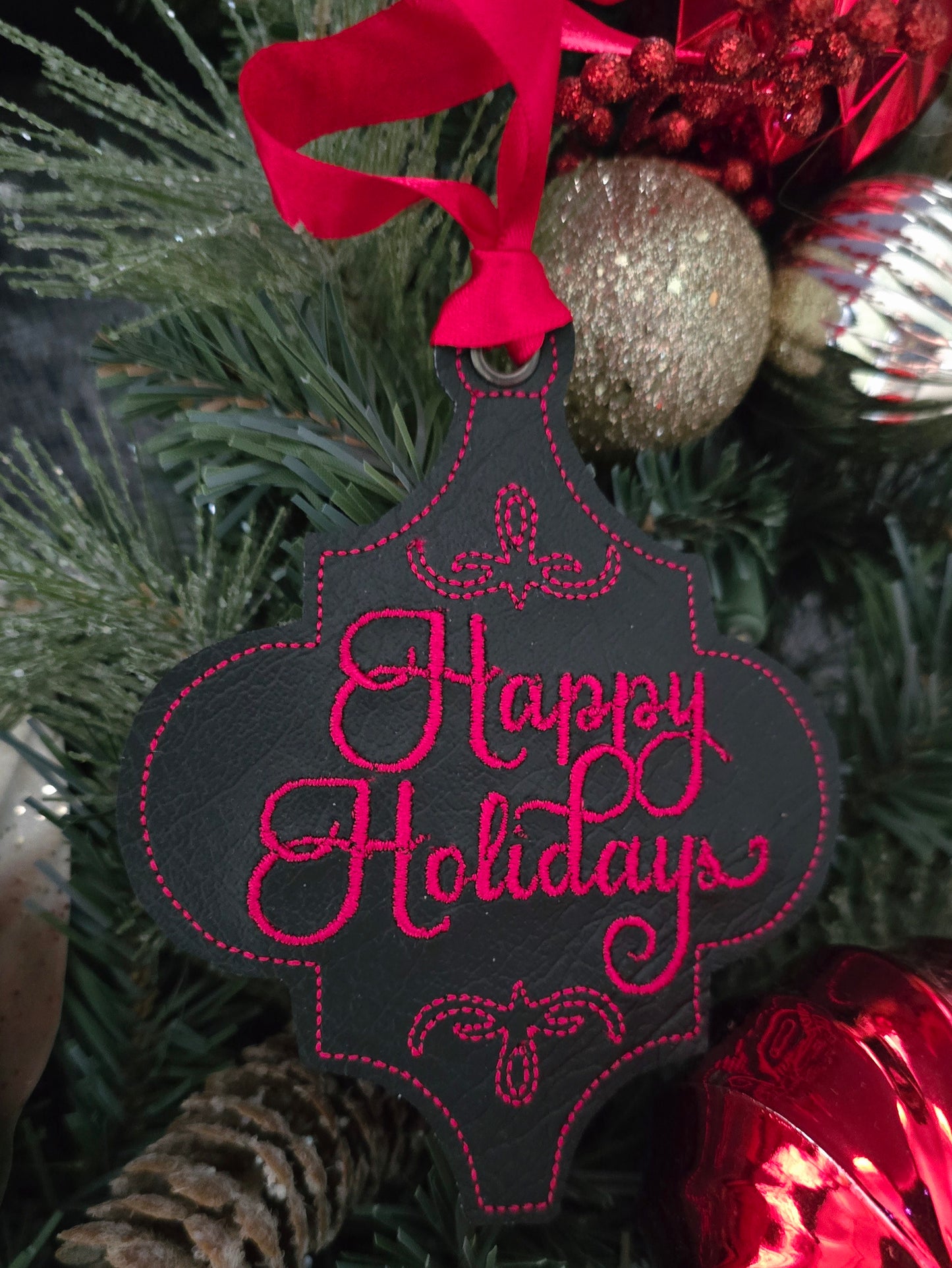 Happy Holidays, handcut vinyl ornament with satin ribbon